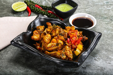 Vietnamese cuisine - fried frog with vegetables