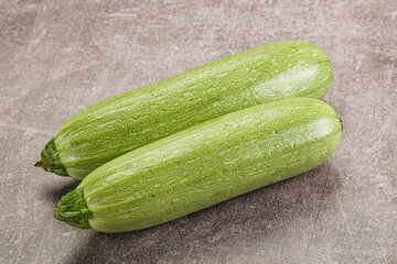 Raw green ripe zucchini vegetable