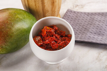 Spicy pickled raw green mango