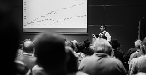 Speaker Giving a Talk at Business Meeting. Audience in the conference hall. Business and...