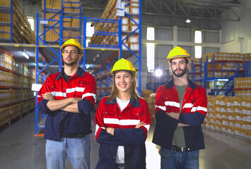Warehouse worker working in warehouse storage. Foreman or worker work at factory site check up...