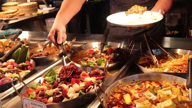 Serving Food at Queen Victoria Market