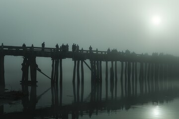 Mystical Morning at U Bein Bridge: Monks Walking through Misty Ambiance