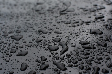 Drops of water on a black background with shadows For making background images