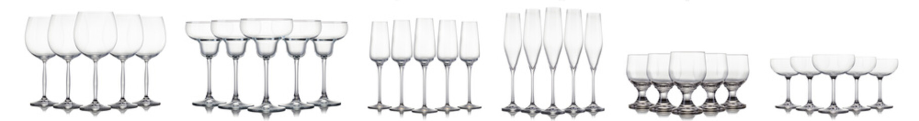 Set of different empty glasses for drinks and cocktails on white background