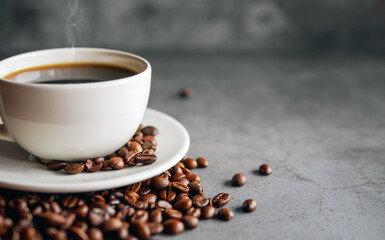 Coffee cup and coffee beans on  gray background, Black coffee cup aromatic,Close up