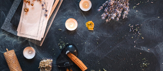 Esoterics,occultism,Astrology.practitioner calculates  makes a forecast fate using Tarot cards, Fortune tellingTarot cards,magic crystal,occultism,Esoteric background.Fortune telling,Tarot predictions