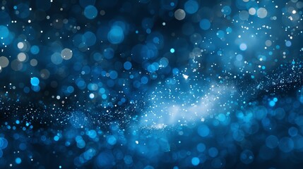 Obraz premium Abstract blue bokeh background with a soft glow and blurred lights. Photo perfect for a festive or celebratory design.