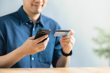 Digital money transfer, banking and e commerce concept. Mobile payment with wallet app technology. Man paying and shopping with smartphone application.
