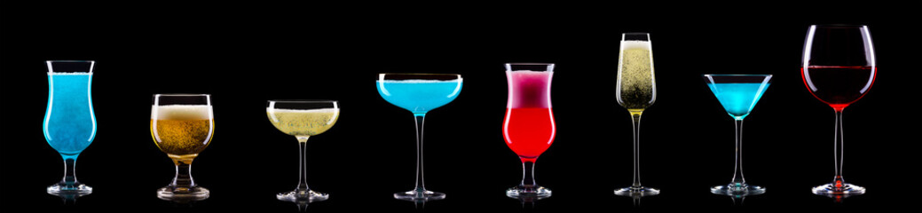 Set of different glasses for drinks and cocktails on black background