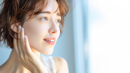 Fototapeta premium 輝く肌の女性