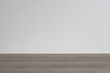 home interior of a room with parquet floor and gray wall