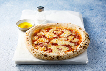 Traditional Italian pizza with sausage and cheese