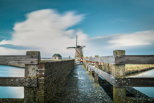 Windmill on wadden sea island Texel belonging to the Nehterlands, Europe, tourism landmark in its landscape