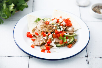 Roasted pork fillet with tomato salsa