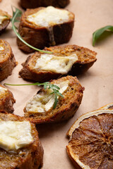 Warm and crispy cheese-topped bread with a sprinkle of herbs for a simple pleasure.