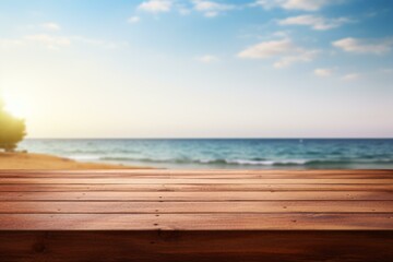 Fototapeta premium An empty wooden table positioned against a blurred backdrop of the vast ocean and sky.