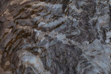 The background has a beautiful granite texture that looks solid.