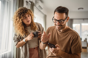Husband want to use mobile phone alone while his wife try to join him