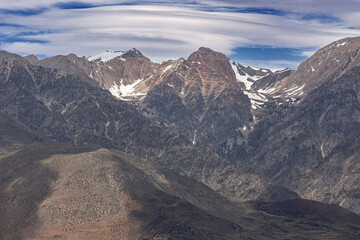 Summer landscape of the Eastern Sierra Nevada Mountains and lenticular clouds, California, USA
