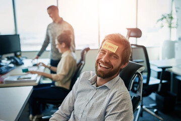 Man, portrait and paper on forehead in office with happy reminder, work break and comedy prank by...