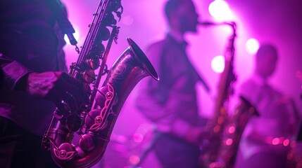 Fototapeta premium Musicians playing saxophones on stage with purple lighting