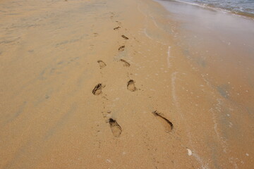 Footprints on the beach, beautiful sand 