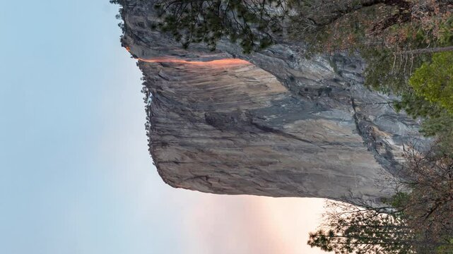 Vertical View Of Yosemite Firefall At Horsetail Fall On El Capitan in Yosemite National Park, United States. Timelapse
