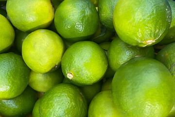 Limes closeup green colors ripe fruit