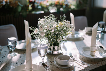 Elegant dining table with luxurious decor, perfect for a refined dining experience.