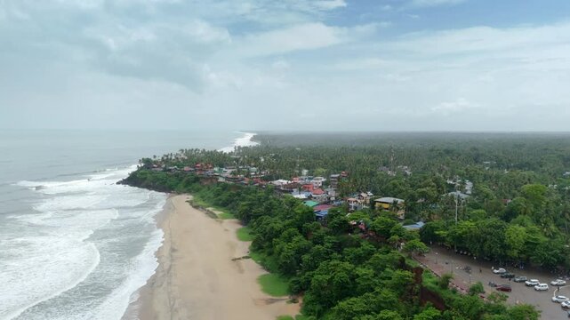 Shoreline of Varkala Cliff Beach, drone view of Varkala beach from the top of the cliff also known as Papanasham Beach, Thiruvananthapuram, Kerala, India