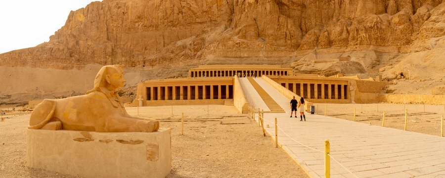 View of sphinx and Mortuary Temple of Hatshepsut, UNESCO World Heritage Site, Deir el-Bahari, Thebes, Egypt, North Africa, Africa