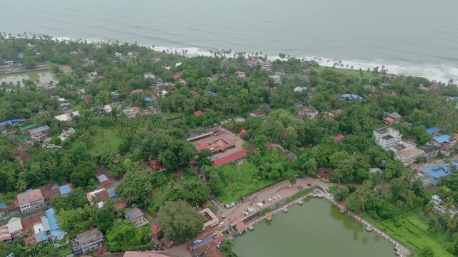 Drone view of Varkala janardhana swamy temple and Papanasham Beach, Thiruvananthapuram, Kerala, India