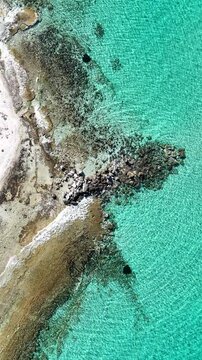 Aerial drone shot of beach and sea at Afitos, Chalkidiki, Greece.
