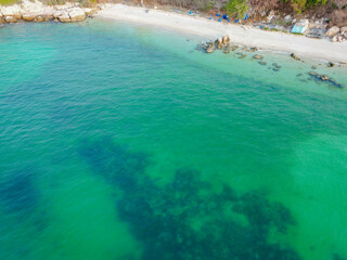 Aerial view white sand sea beach wave turquoise water with tropical forest