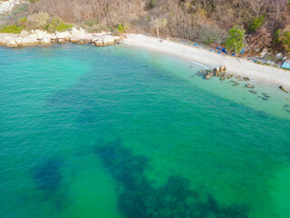 Aerial view white sand sea beach wave turquoise water with tropical forest