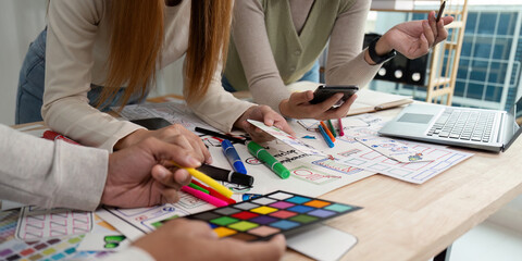 Creative UX Developer and UI Designer Brainstorming Session with Color Palettes and Wireframes