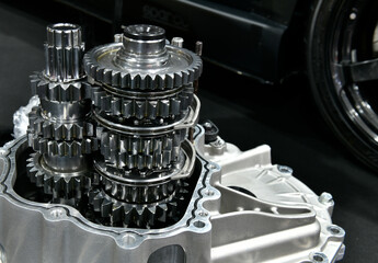 Closeup open car gearbox automatic transmission part on black background