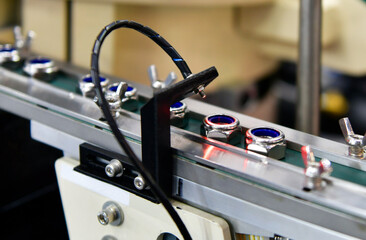 Automatic vision system for inspection nuts in product line industrial	