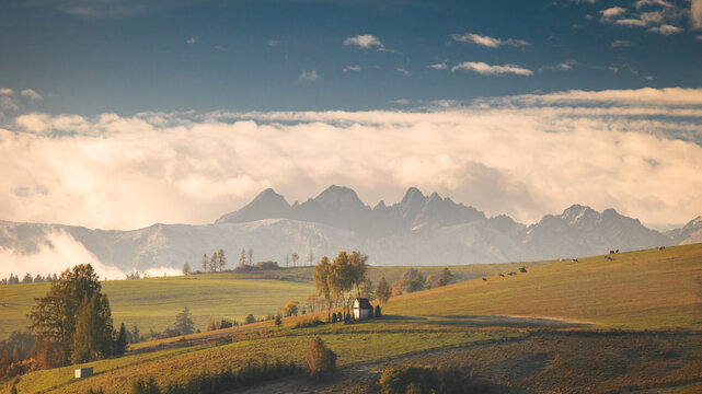 Chapel in Kacwin during autumn morning with view to Tatra Mountains