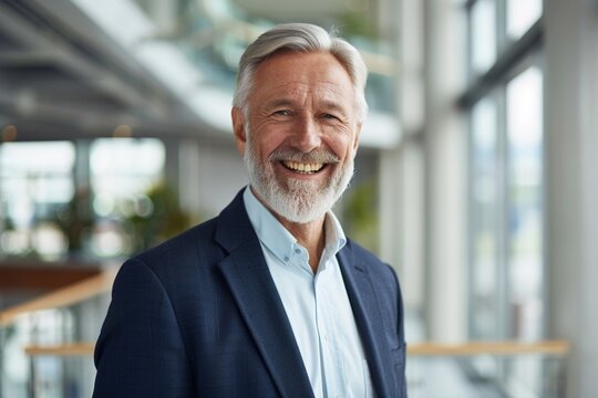 smilling middle aged sucessfull happy business man company CEO standing in office arms crossed. mature confident professional executive manager, businessman, lawyer