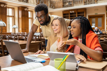 Group of young people working together and looking involved