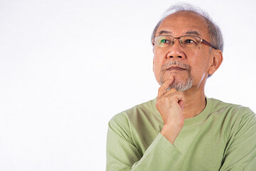 Portrait Asian grey haired with glasses senior man face thinking about something studio shot isolated on white background, elderly with a thoughtful expression holds chin thinking about question