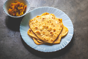 Indian food paratha made of wheat flour white potato curry.  