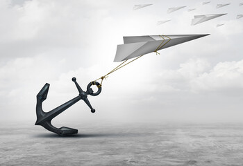 Obstructed From Opportunity and Obstruction to progress as a metaphor or dragged down business concept as a paper plane symbol impeded and restricted. © freshidea