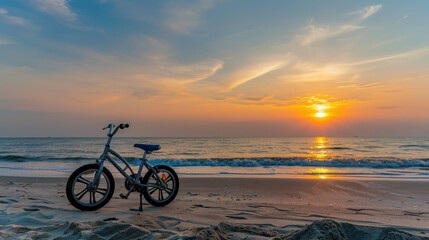 Obraz premium A Bicycle Beckons at Sunrise on the Beach