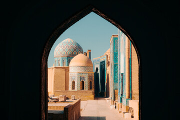 Shahi Zinda Ensemble framed in a door  in Samarkand, Uzbekistan