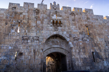 The facade of the Lions' gate, the Biblical entrance to the Old Town of Jerusalem, and...