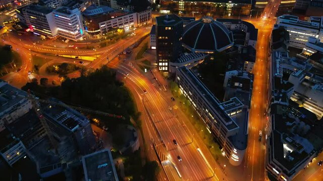 Aerial, drone view of the streets of Basel, Switzerland in the evening