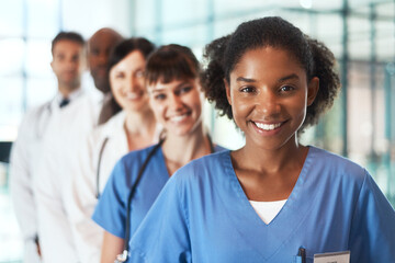 Portrait, happy people and team of nurses in clinic for healthcare services, career or about us. Leadership, medical professionals and proud doctors with smile at wellness hospital ready for nursing